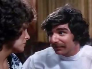 70s dirty film brunette gives deep Blowjob to a medical man